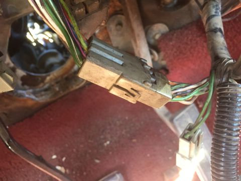 1986 Ford Bronco - This image shows a close-up of a vehicle's electrical connector and wiring, not a specific model year.