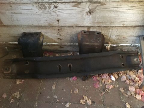 1986 Ford Bronco - These are frame parts for a Ford Bronco, possibly a crossmember and mounting brackets.