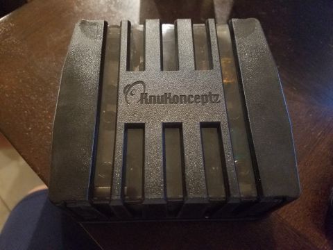 1994 Ford Bronco - This black KnuKonceptz audio component is shown from a top-down perspective.