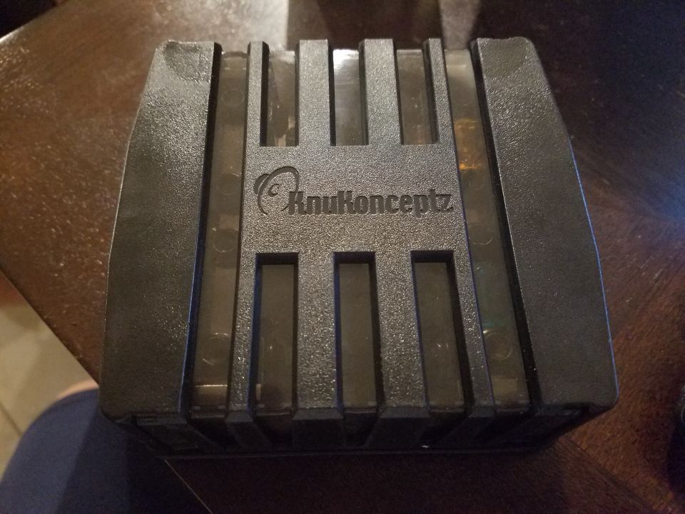 Black KnuKonceptz audio component with ribbed top
