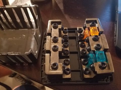 1994 Ford Bronco - Car fuse box with multiple screw terminals and installed fuses.
