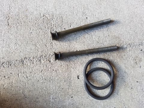1995 Ford F-250 - Putting new o rings on the doghouse screws.