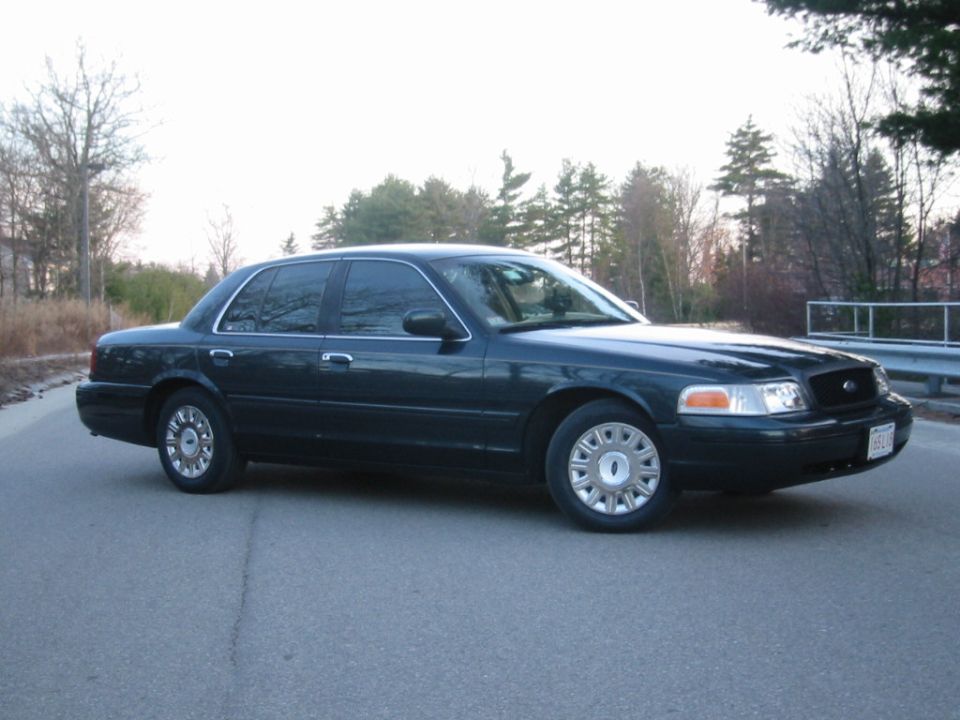 Dark 1998 Ford Crown Victoria, 3/4 front view