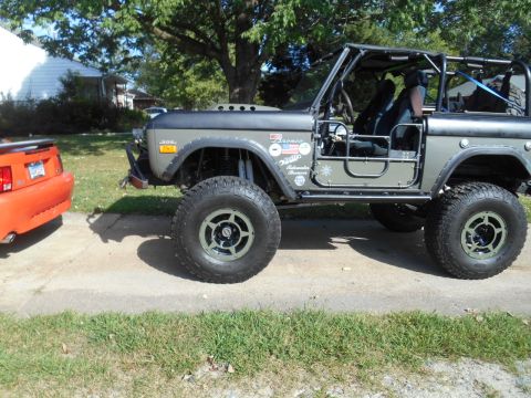 1972 Ford Bronco - This modified 1972 Ford Bronco features large off-road tires, a roll cage, and custom doors.