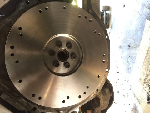 1986 Ford Bronco - Flywheel and engine block assembly, likely for a manual transmission swap.