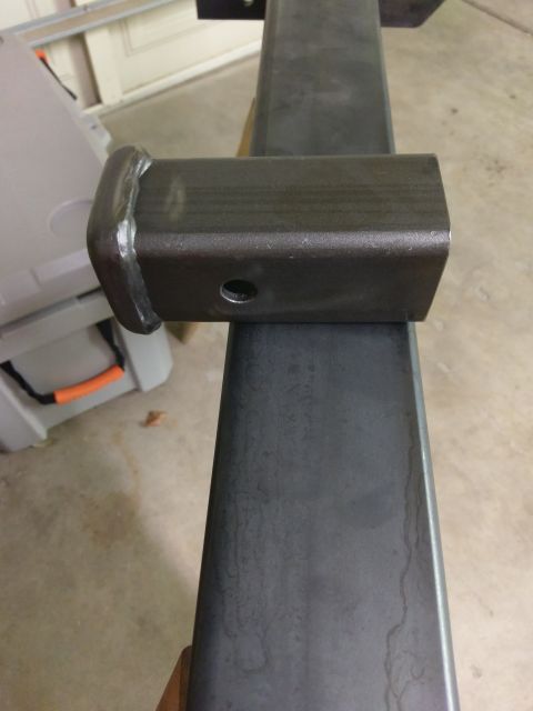 1988 Ford Bronco - Close-up of a trailer hitch receiver tube, showing its construction and pin hole.