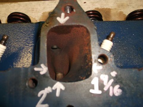 1971 Ford Ranchero - Close-up of an engine cylinder head, showing spark plugs and hand-drawn measurements and arrows.