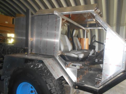 1992 Ford Bronco - This custom vehicle is in the process of being built, showing its interior and unfinished exterior.