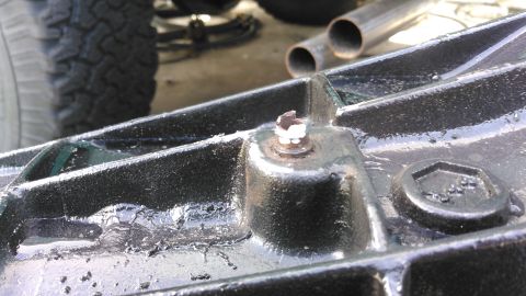 1996 Ford Bronco - i used a grinder to grind the top so it was narrow enough for transmission cooler hose to go over