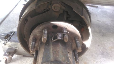 1990 Ford F-250 - found this broken spring and was the reason i had a bad noise in the drums. i figured why put money into fixing drums when im doing disc an…