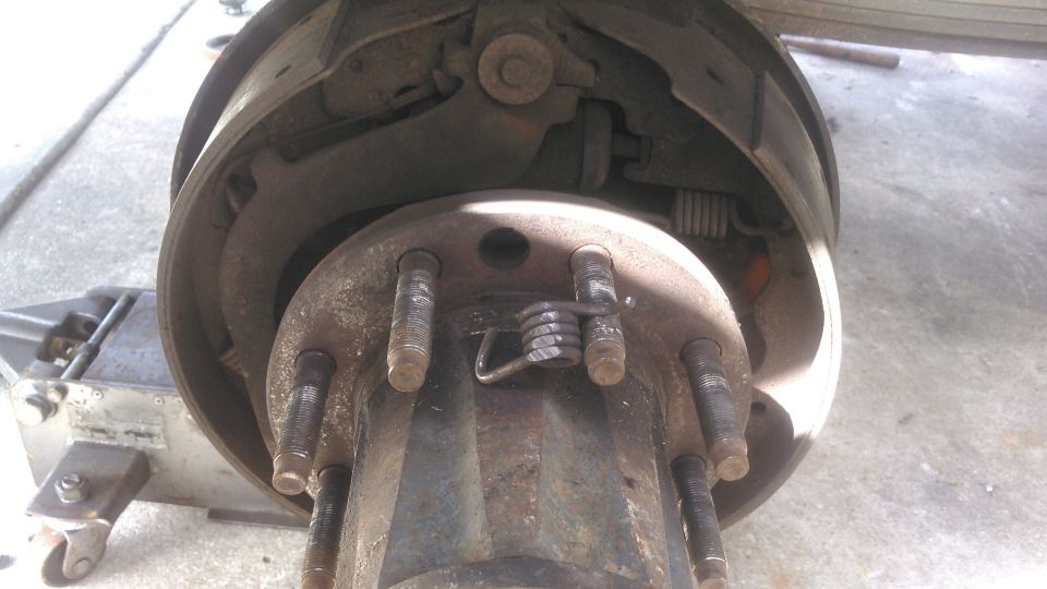 found this broken spring and was the reason i had a bad noise in the drums. i figured why put money into fixing drums when im doing disc anyways