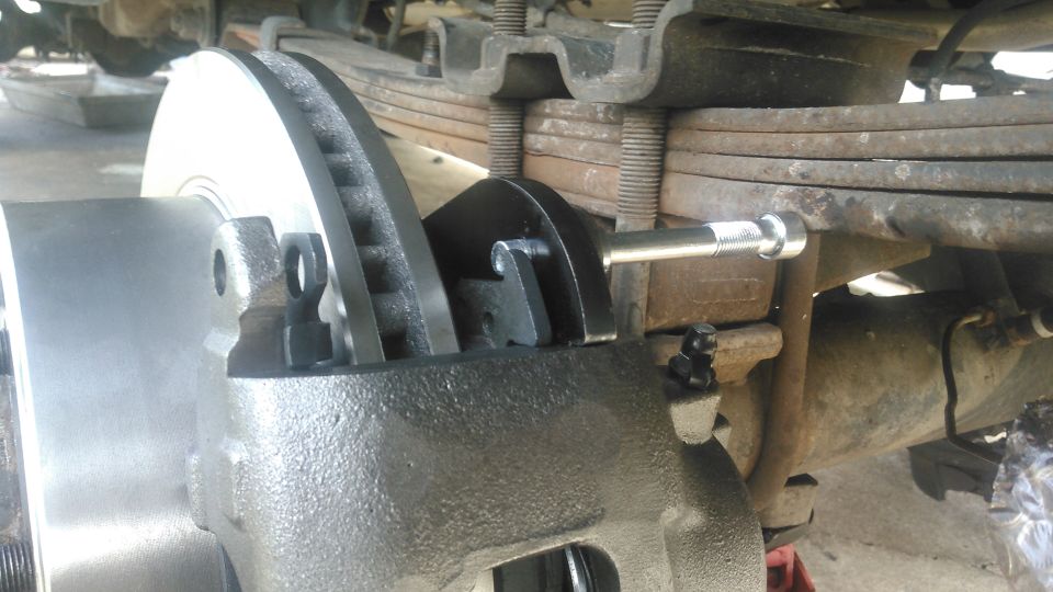 issue i found is that i cant get the upper caliper pin in or out easily because of the leaf spring.

i debated keeping the bracket like this where its hard to disassemble/reassemble or i could rotatie it so its easier but might cause issues bleeding the brakes. i decided i shouldn't need to bleed the brakes often so i choose the later