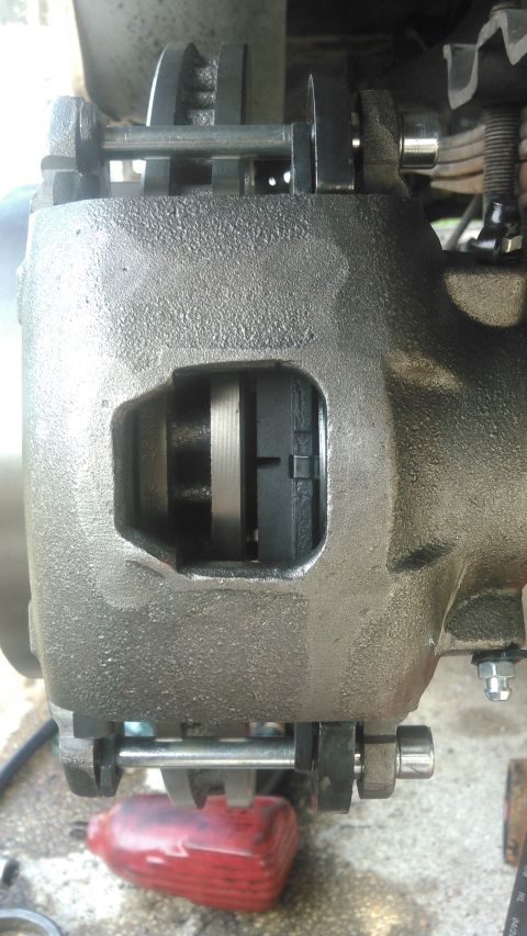 1990 Ford F-250 - this is the brakes completely mocked up note that as the pads wear, the caliper will slide inward. when shimming the axle keep in mind that…