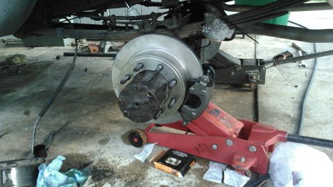 1990 Ford F-250 - i went ahead and replaced the wheel bearings and seals. then i did final install. tighten the spindle nut to 55-65 ft-lb while rotating hub…
