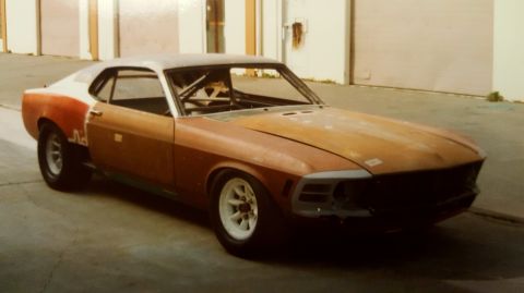1973 Ford Mustang - This 1970 Ford Mustang project car is in primer and has a roll cage installed.