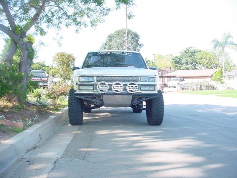 1988 Ford Bronco - Ryan 89 silverado prerunner. 350, 4.56s, CST longtravel w/custom prerunner bumper and 3 hella 4000s.