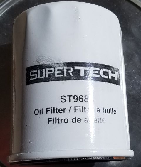 2000 Ford Crown Victoria - A Super Tech oil filter, model ST9688, is shown close-up.