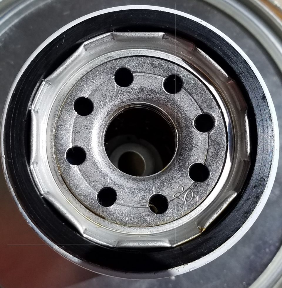 Oil filter with visible '20' marking