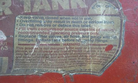 1995 Ford Bronco - This label provides safety warnings and operating instructions for an air tank, including "Keep valve closed when not in use" and "WARNING."