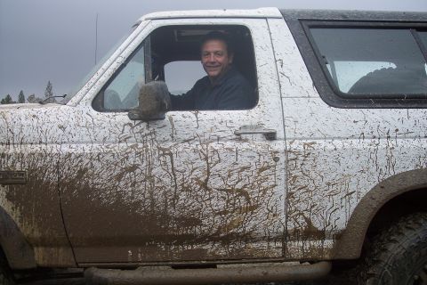 1995 Ford Bronco - This 1995 Ford Bronco is heavily covered in mud after off-roading.