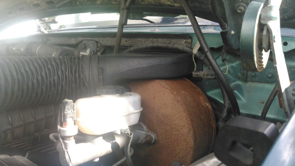 this is it mocked up. it goes through the firewall, above the brake booster