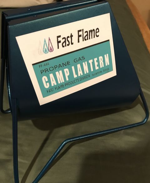1995 Ford Bronco - A blue metal camp lantern with a label indicating it is a Fast Flame propane model FF-444.