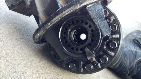 2002 Mitsubishi Montero Sport - This is a close-up view of a vehicle's differential housing, showing internal gears and external bolts.
