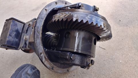 2002 Mitsubishi Montero Sport - Differential assembly with exposed gears and housing, some oil visible.