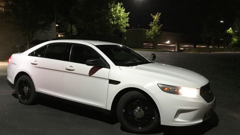 2013 Ford Taurus - Brand new tires and rims with the police caps and spotlight temporally added.