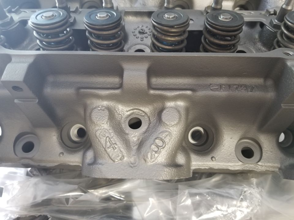 Engine cylinder head with part number C1737 and casting marks 4 and 8