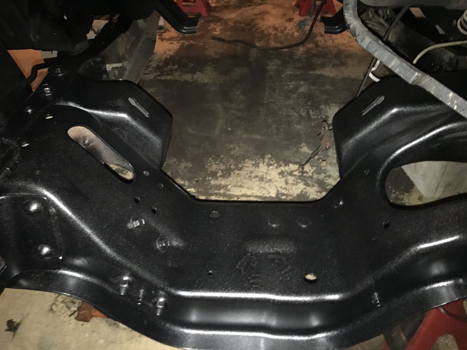 Black painted vehicle subframe assembly