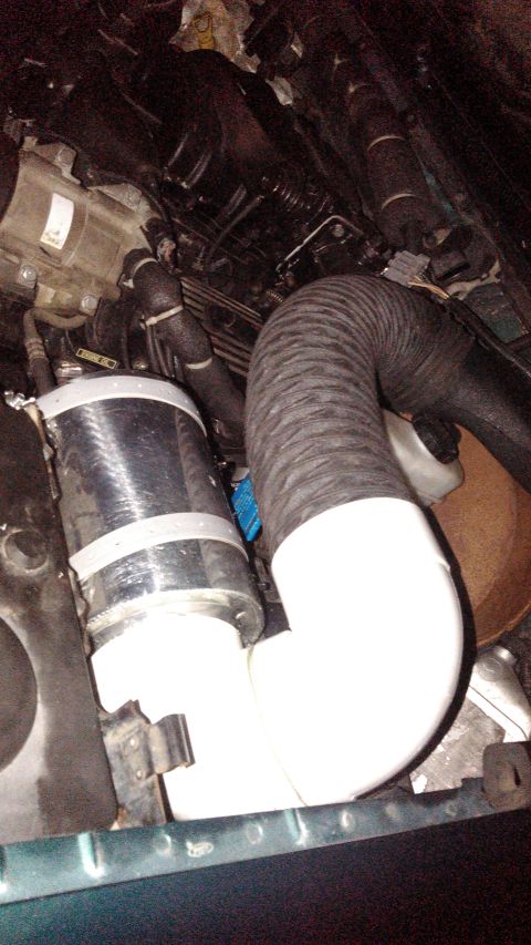 1996 Ford Bronco - Custom intake piping is visible in the engine bay, connected to a silver canister.