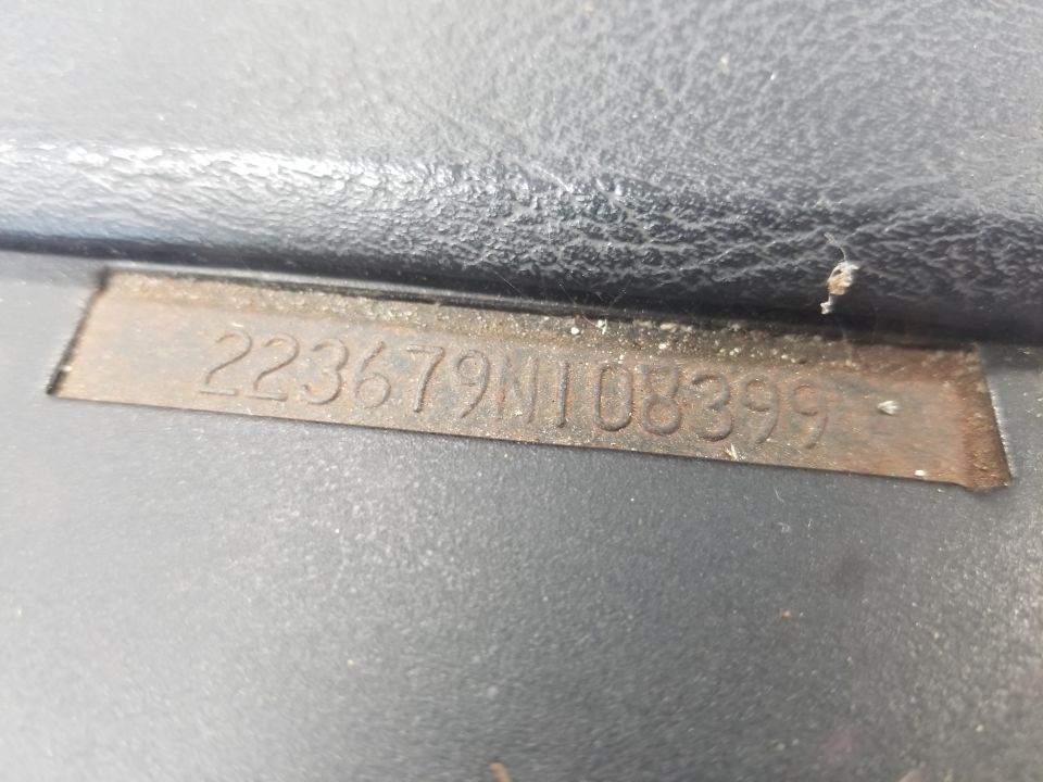 Stamped identification number 223679N108399 on a metal plate.