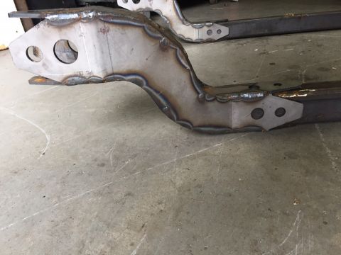 1994 Ford Bronco - Close-up view of custom-welded metal frame components, likely for an automotive application.