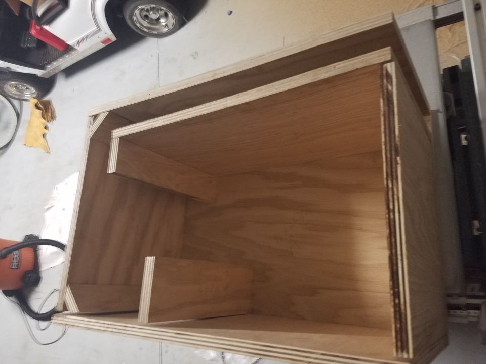 Custom wooden stereo enclosure with internal bracing