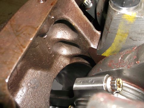 1967 Ford Mustang - Detailed view of an engine block's internal casting, showing metal texture and some markings.