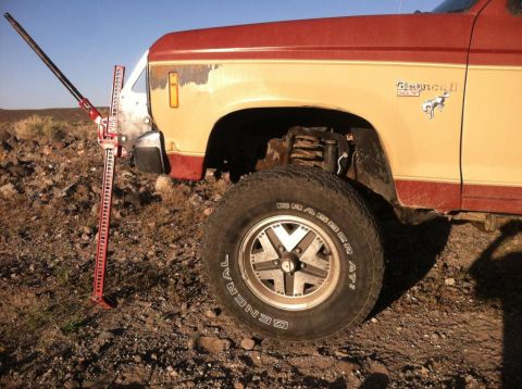 1987 Ford Bronco II - 1987 Ford Bronco II with a Hi-Lift jack attached to the fender.