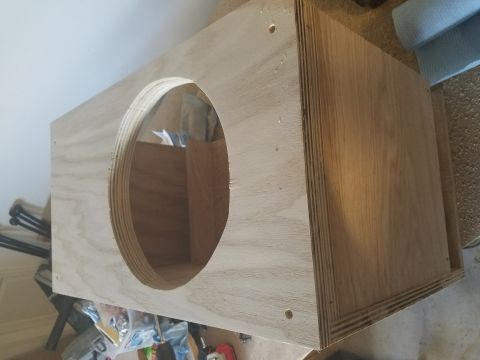 1994 Ford Bronco - Photograph of an assembled plywood speaker box showing the round speaker opening.
