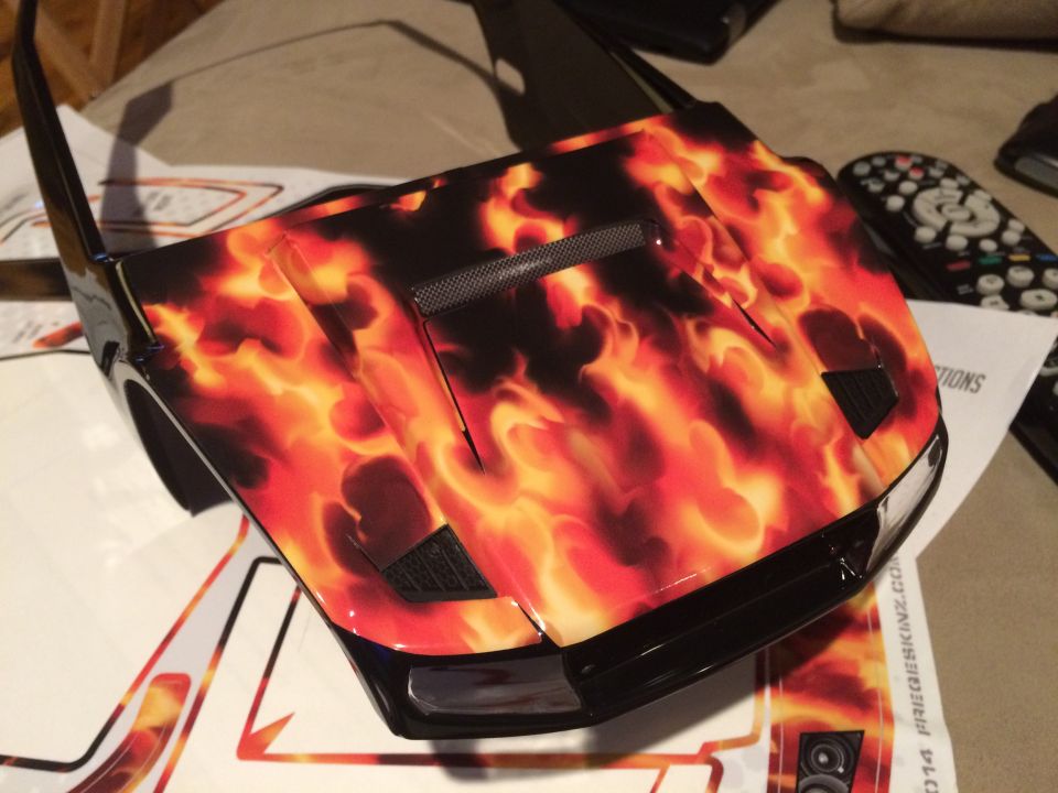 RC car body with flame graphics