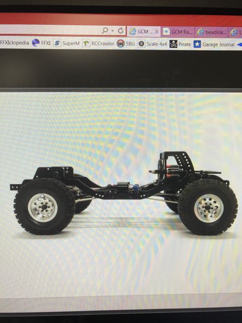 1989 Ford Bronco - This is a side view of a remote-controlled vehicle's chassis, its suspension and wheels.