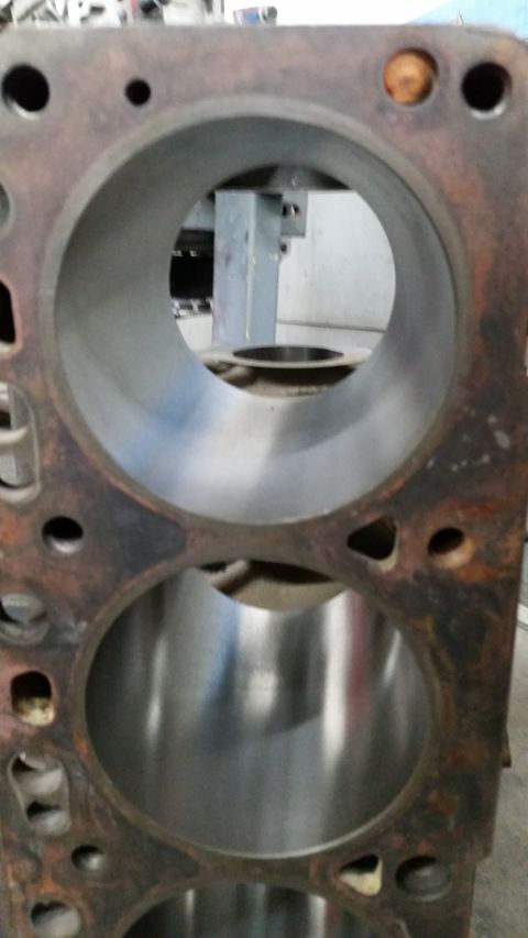 1981 Ford Bronco - Engine cylinder block with visible cylinder bores, likely for a V8 engine.
