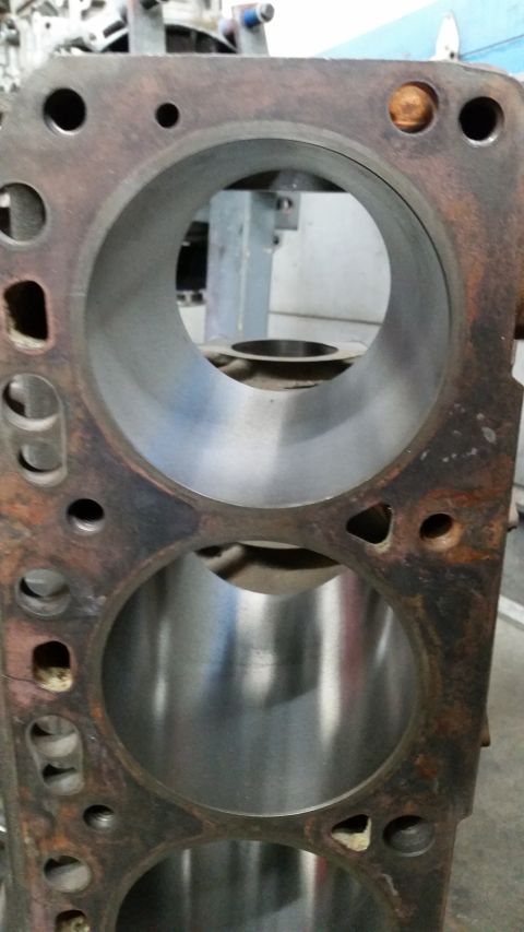 1981 Ford Bronco - This is a close-up view of the cylinders within an engine block, showing signs of wear and rust.