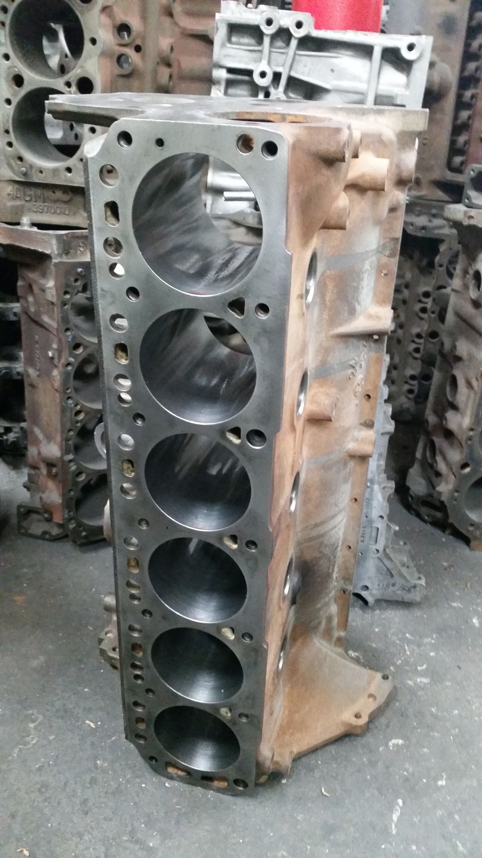 Engine block with six cylinders visible