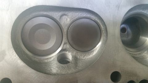 1981 Ford Bronco - This is a close-up view of an engine cylinder head, showing intake and exhaust ports.