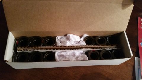1981 Ford Bronco - New valve seals packaged in a cardboard box.