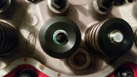 1981 Ford Bronco - A close-up view of engine valve springs and retainers, likely from a Ford Bronco, showing the metallic components with a focus on the black…
