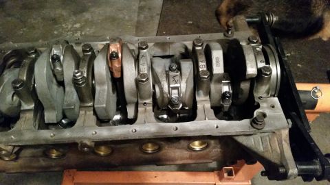 1981 Ford Bronco - The image shows the crankshaft and connecting rods of a V8 engine, likely from a Ford Bronco. The engine block is partially visible, with b…
