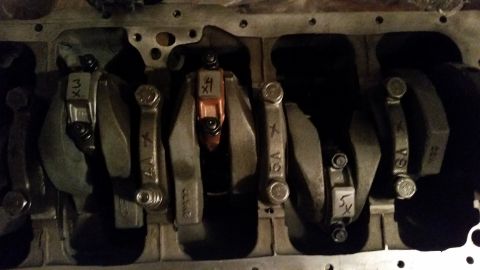 1981 Ford Bronco - This is a close-up view of the crankshaft and connecting rods of an internal combustion engine. The connecting rods are labeled with number…