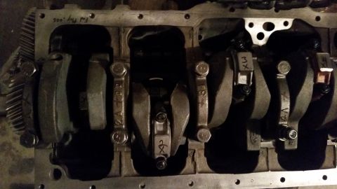 1981 Ford Bronco - Close-up view of an engine block's internal components, including the crankshaft and connecting rods.