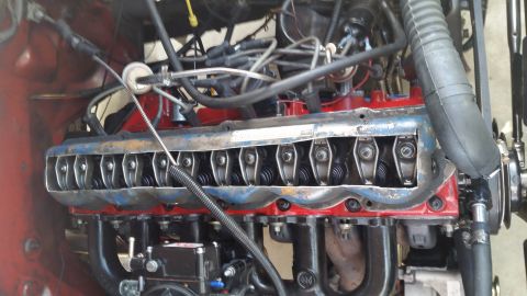 1981 Ford Bronco - Close-up view of an engine's internal components with the valve covers removed.